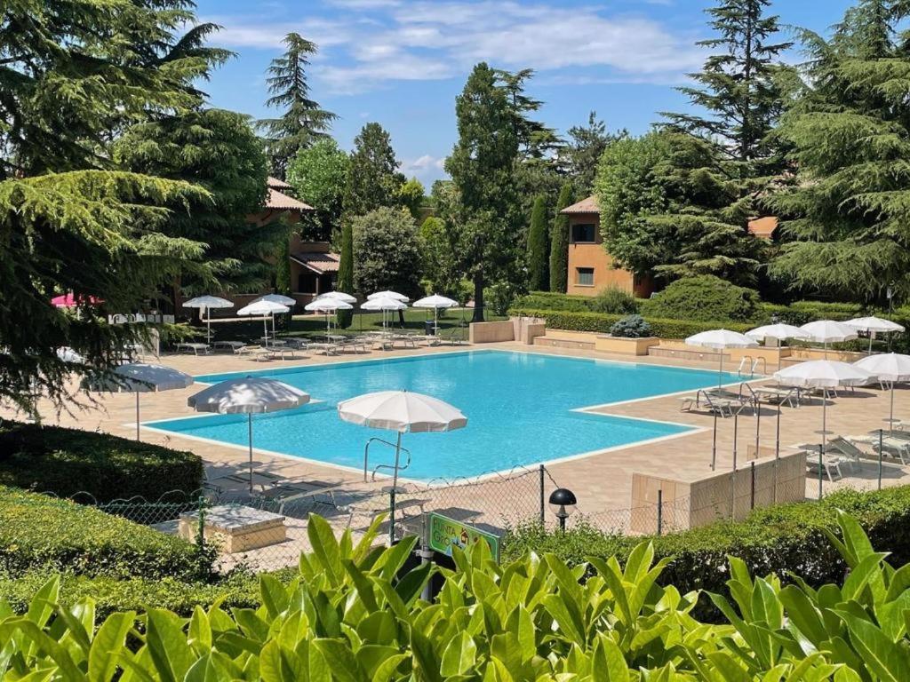 Casa Vittoria Sirmione Punta Gro Con Piscina Exterior foto